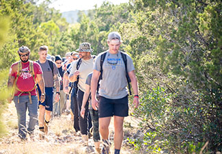 Wounded Warriors hike to honor veterans who died by suicide during Project Odyssey event
