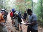 Veterans navigate a hiking trail as a part of the Wounded Warrior Project mental health workshop.