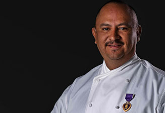 Wounded veteran David Guzman is a Purple Heart recipient who has a passion for cooking and sharing his story through his love of food and compassion for fellow veterans.