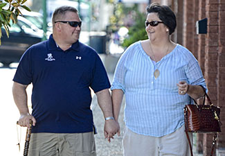A warrior and his wife and caregiver take a walk, Wounded Warrior Project's Independence Program helps severely wounded veterans get the assistance they need.