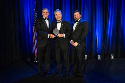Rep. Mark Takano poses with WWP CEO Lt. Gen. (Ret.) Mike Linnington (left) and WWP Vice President of Government and Community Relations, Jose Ramos (right) after receiving the Legislator of the Year Award.