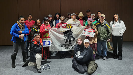 Warriors from the WWP peer support group in Waldorf, Maryland, connect during an event.
