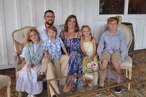 Kris (far right), the oldest of four children, is the son of Chuck and Liz Rotenberry. Chuck is a U.S. Marine Corps veteran living with PTSD, traumatic brain injury (TBI), and hearing issues.   